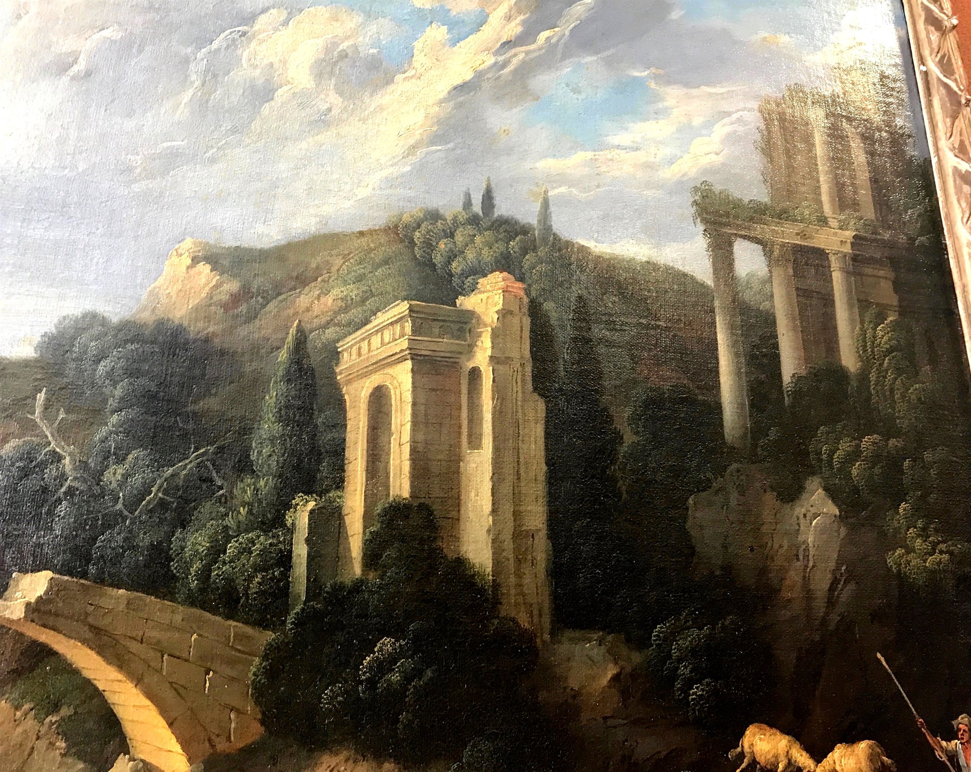 Paesaggio fluviale con capriccio architettonico e gruppo di viandanti