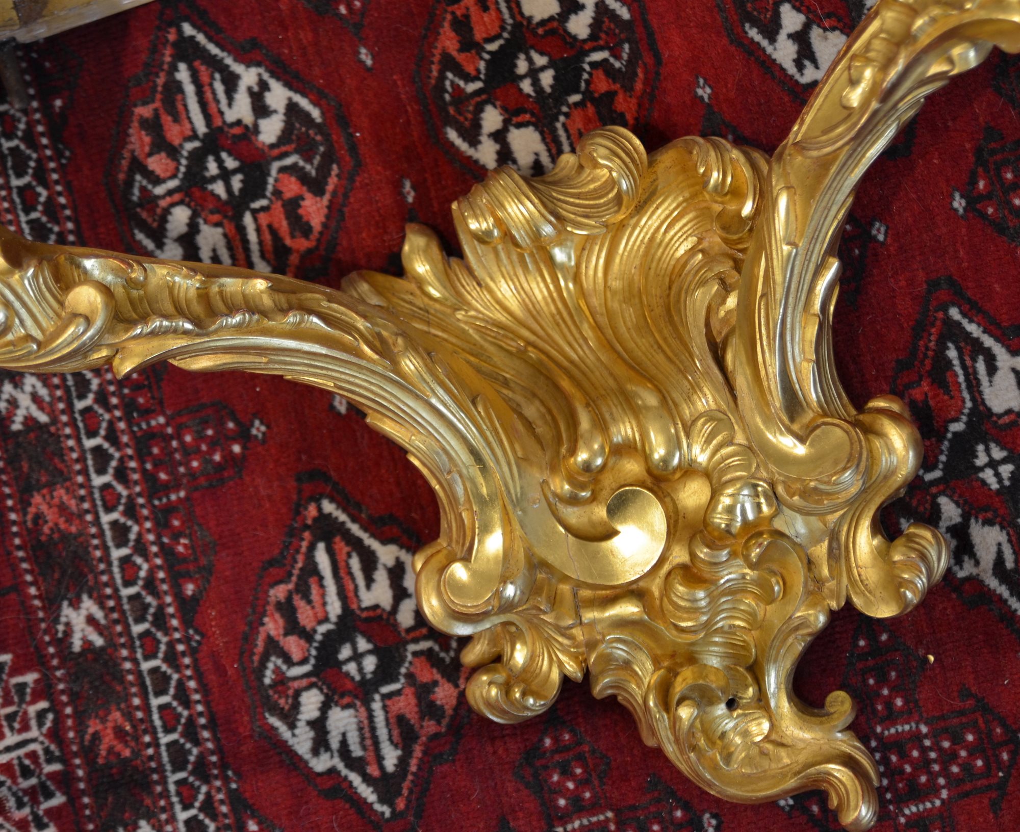 Consolle Luigi XV d'applique in legno intagliato e dorato
