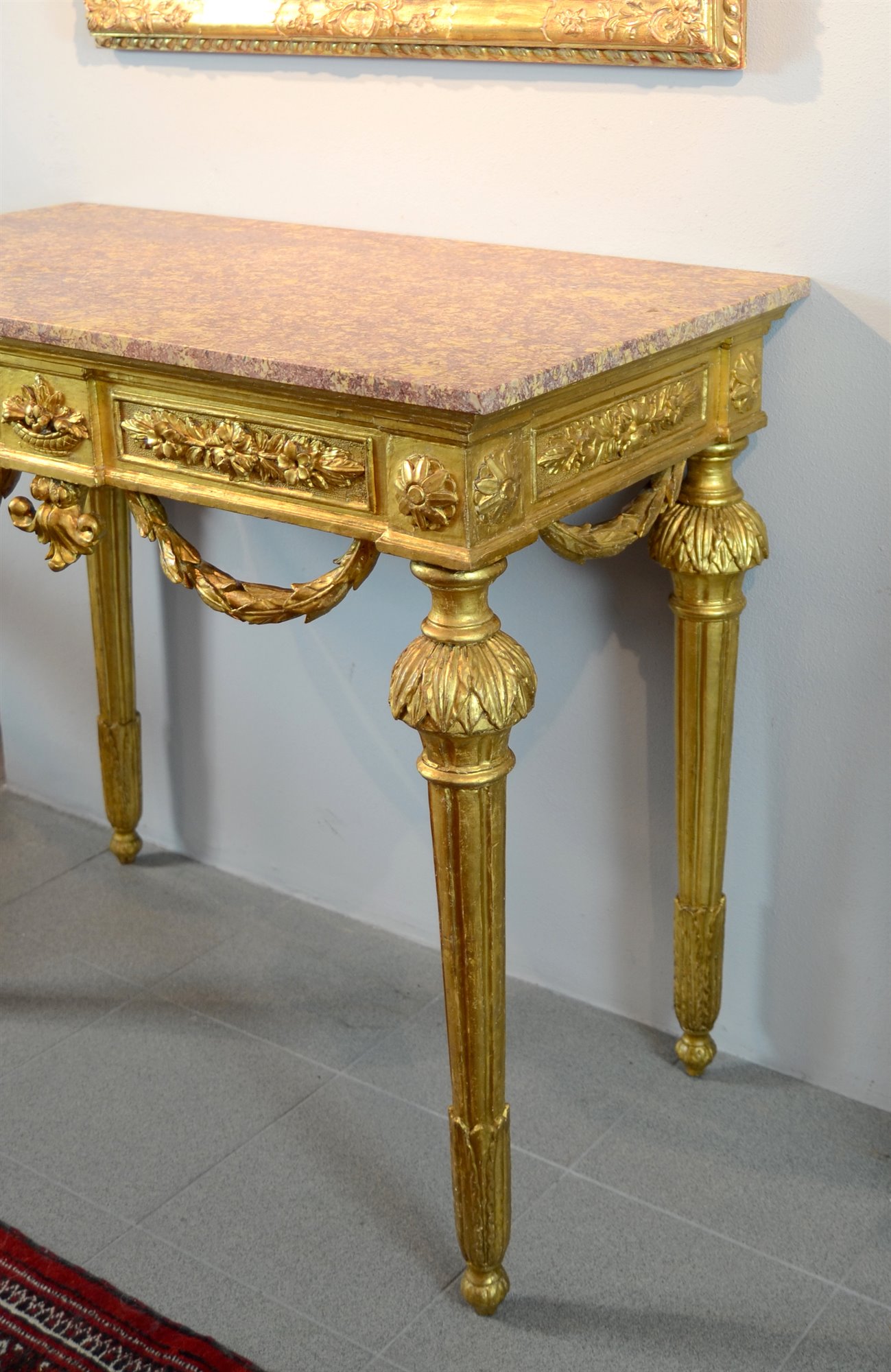 Antica consolle Luigi XVI in legno intagliato e dorato