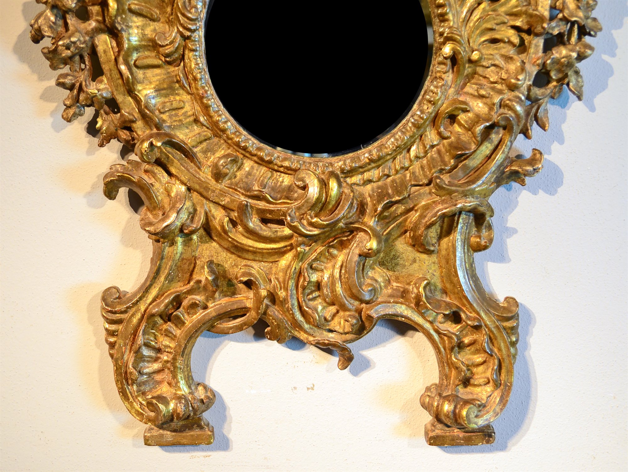 Specchiera Luigi XV riccamente intagliata periodo Rococò