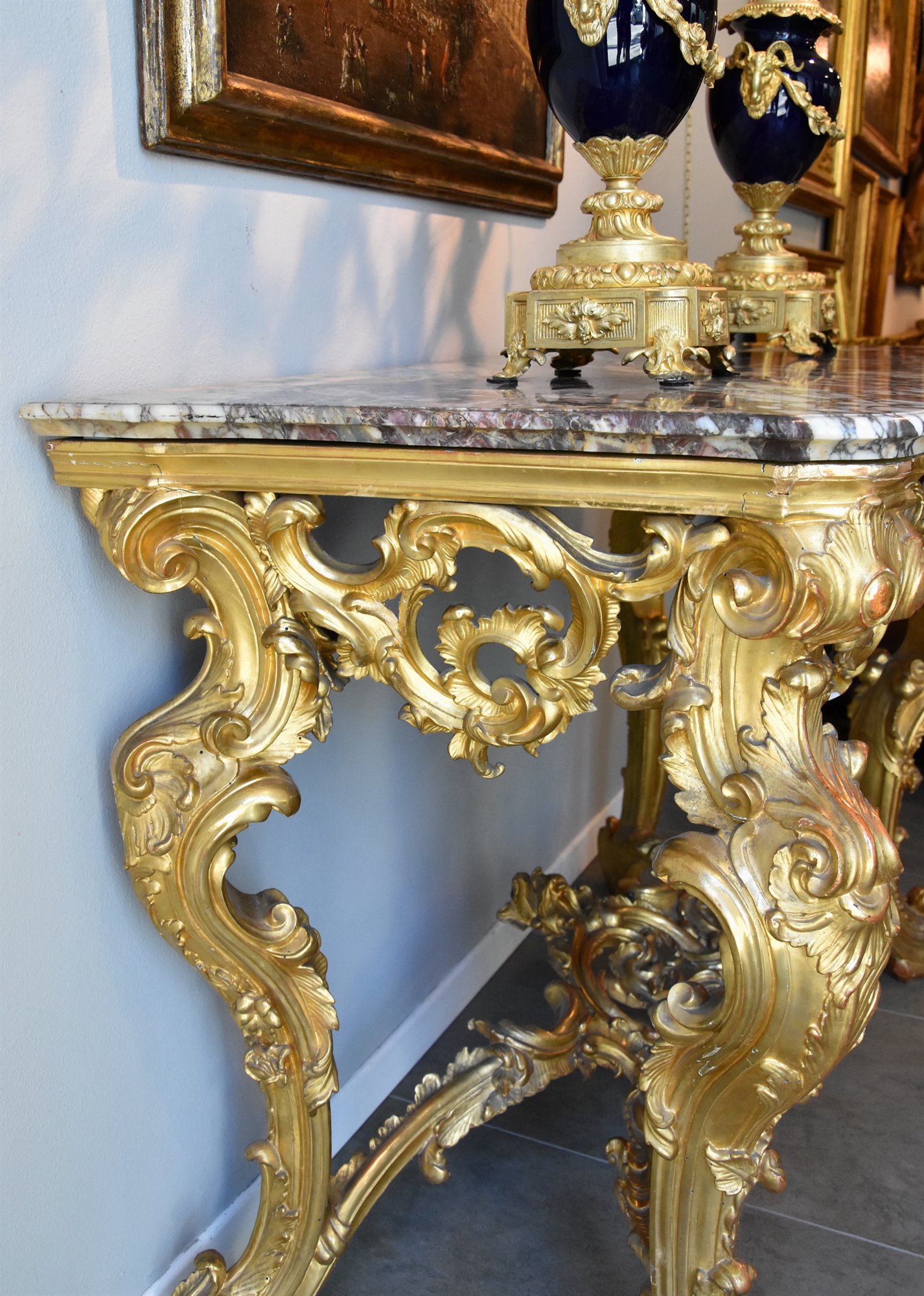 Importante consolle Luigi XV, in legno intagliato, scolpito e dorato