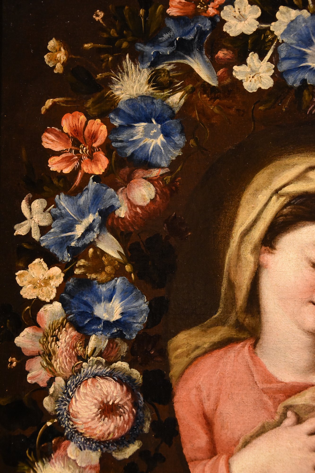 Ghirlanda fiorita con ritratto della Vergine