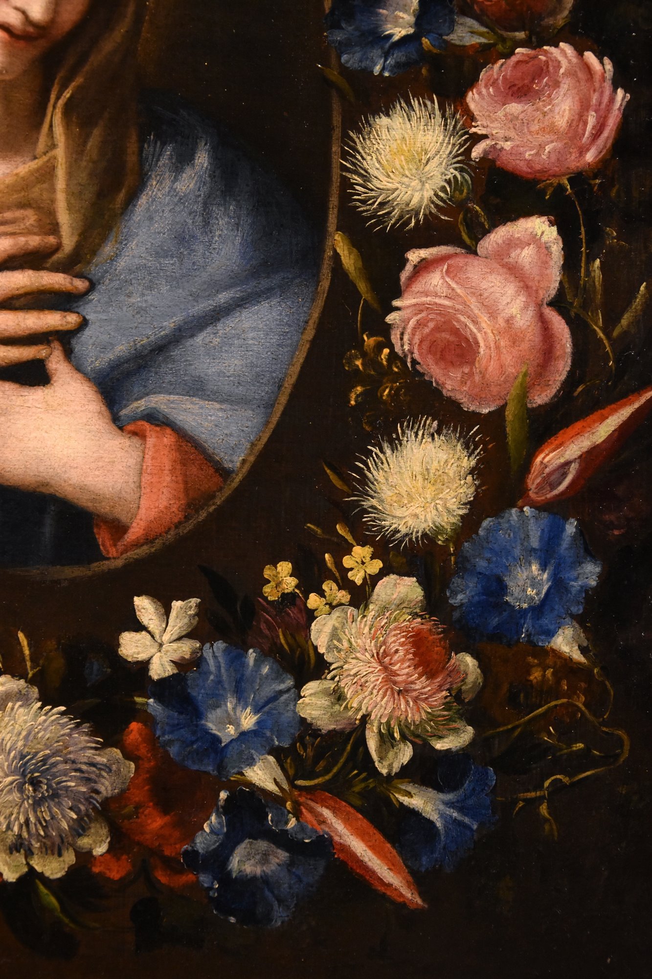 Ghirlanda fiorita con ritratto della Vergine