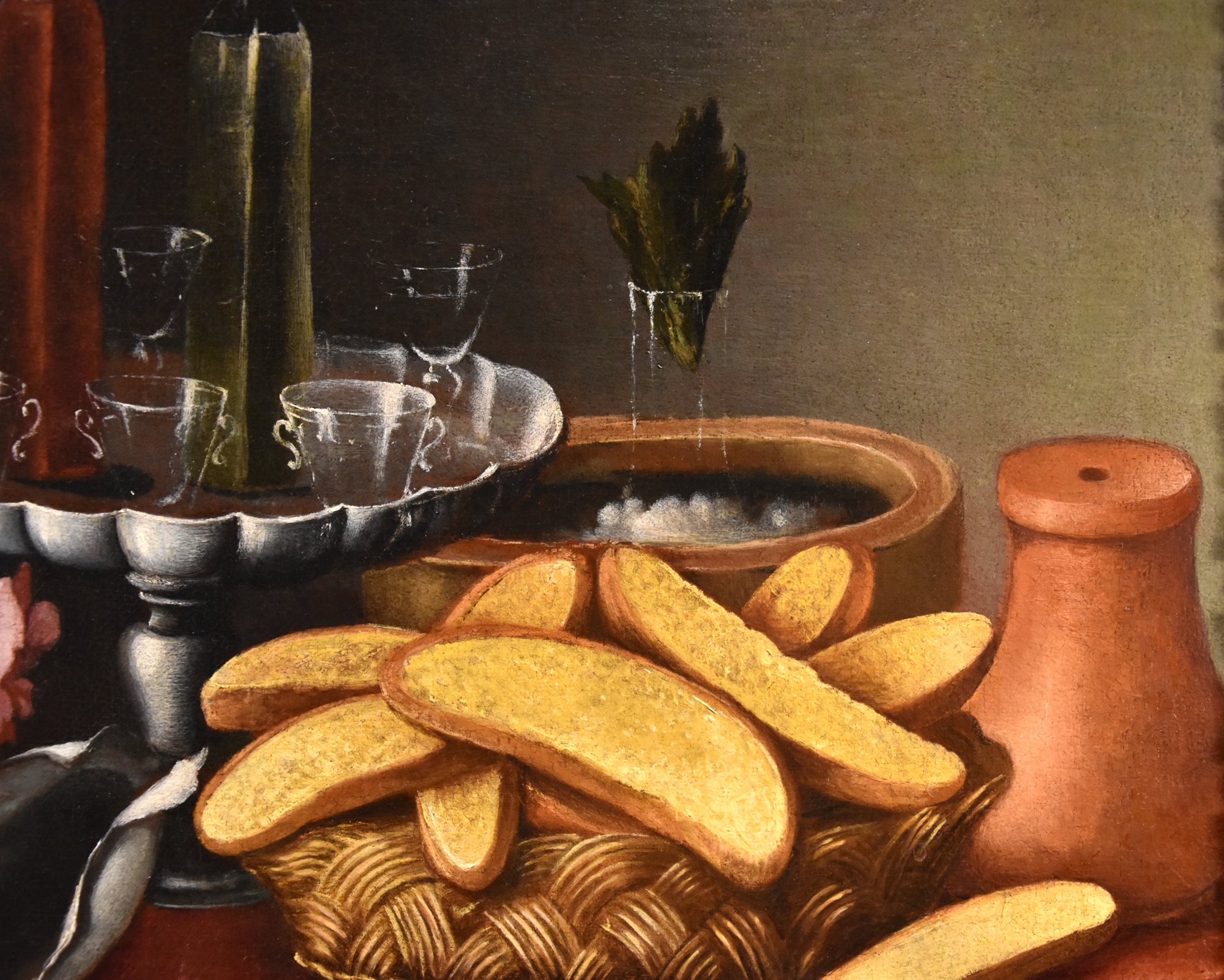 Natura morta con fiori, alzata con cristalli e liquori, porcellane e cesto con biscotti