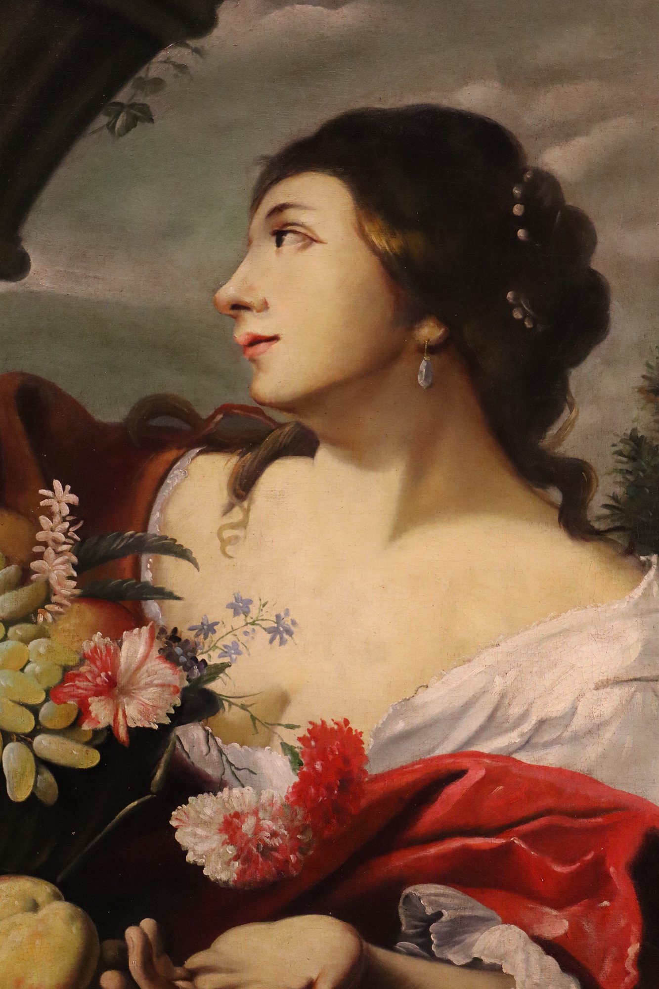 Fanciulla con fiori e frutta