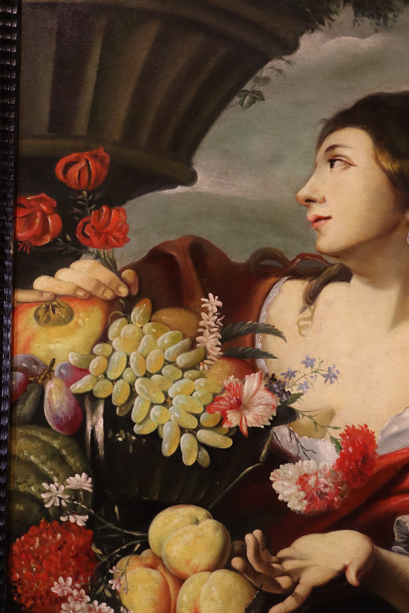 Fanciulla con fiori e frutta