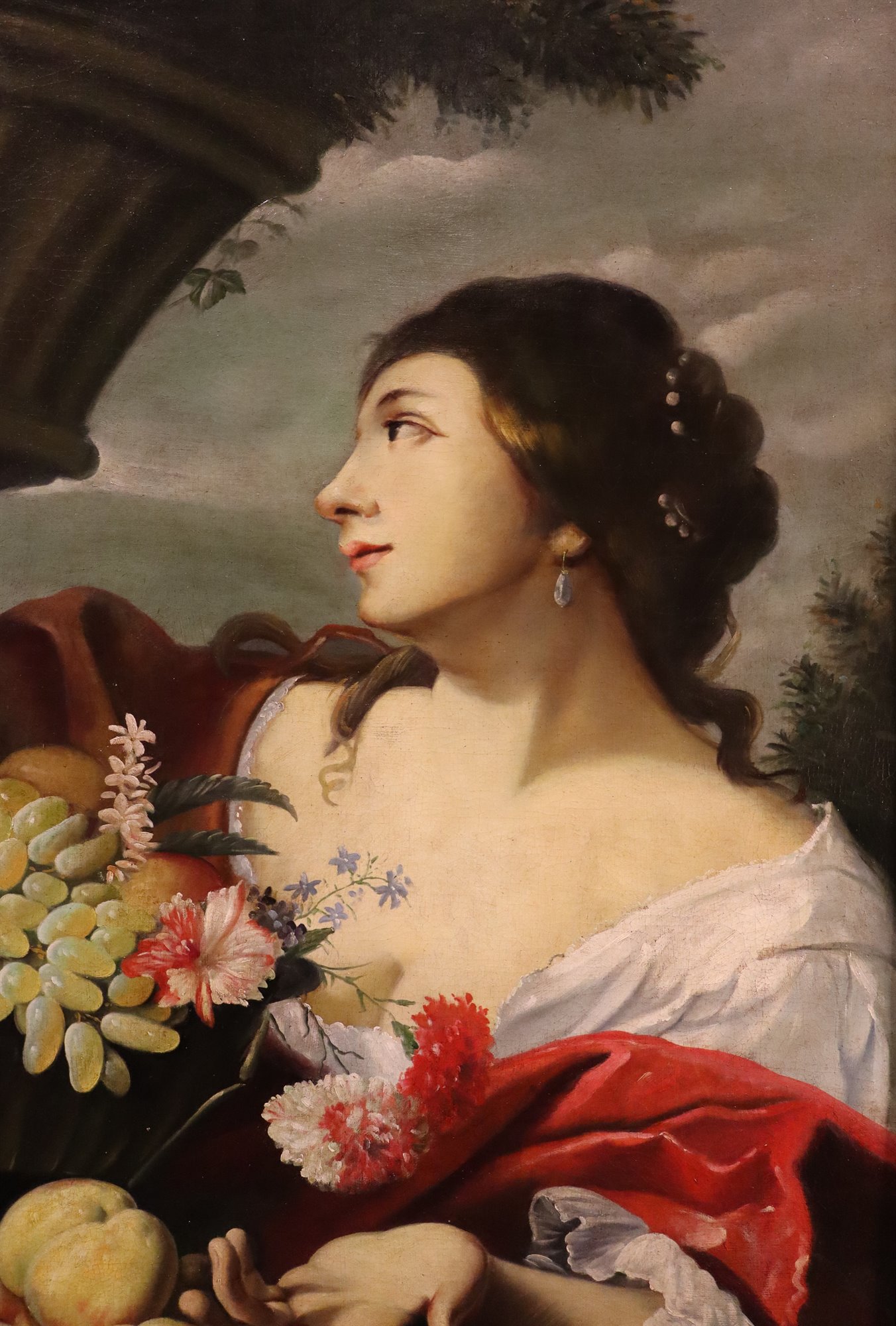 Fanciulla con fiori e frutta