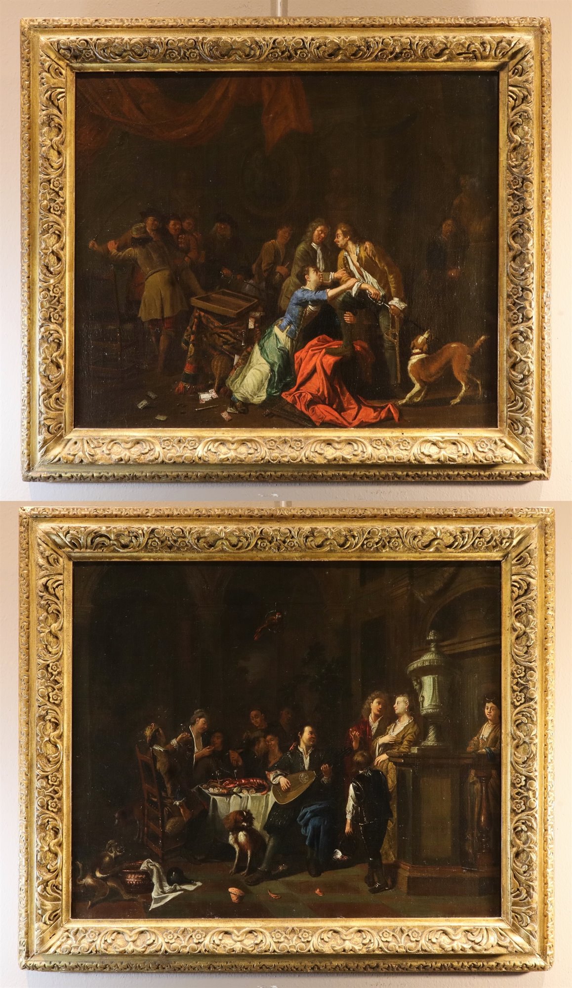 Coppia di interni con scende di genere 'Banchetto' e 'Rissa'