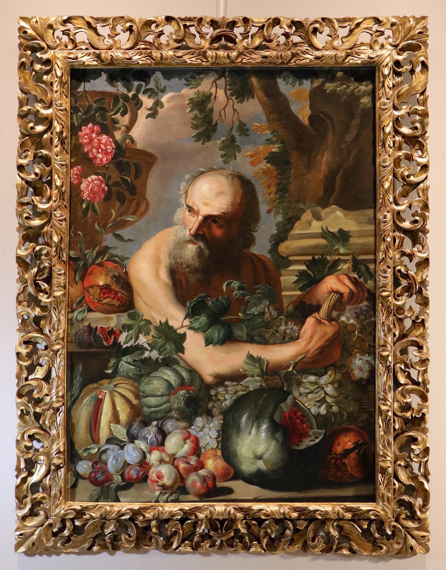Ritratto del filosofo greco Diogene con composizione di frutta e fiori
