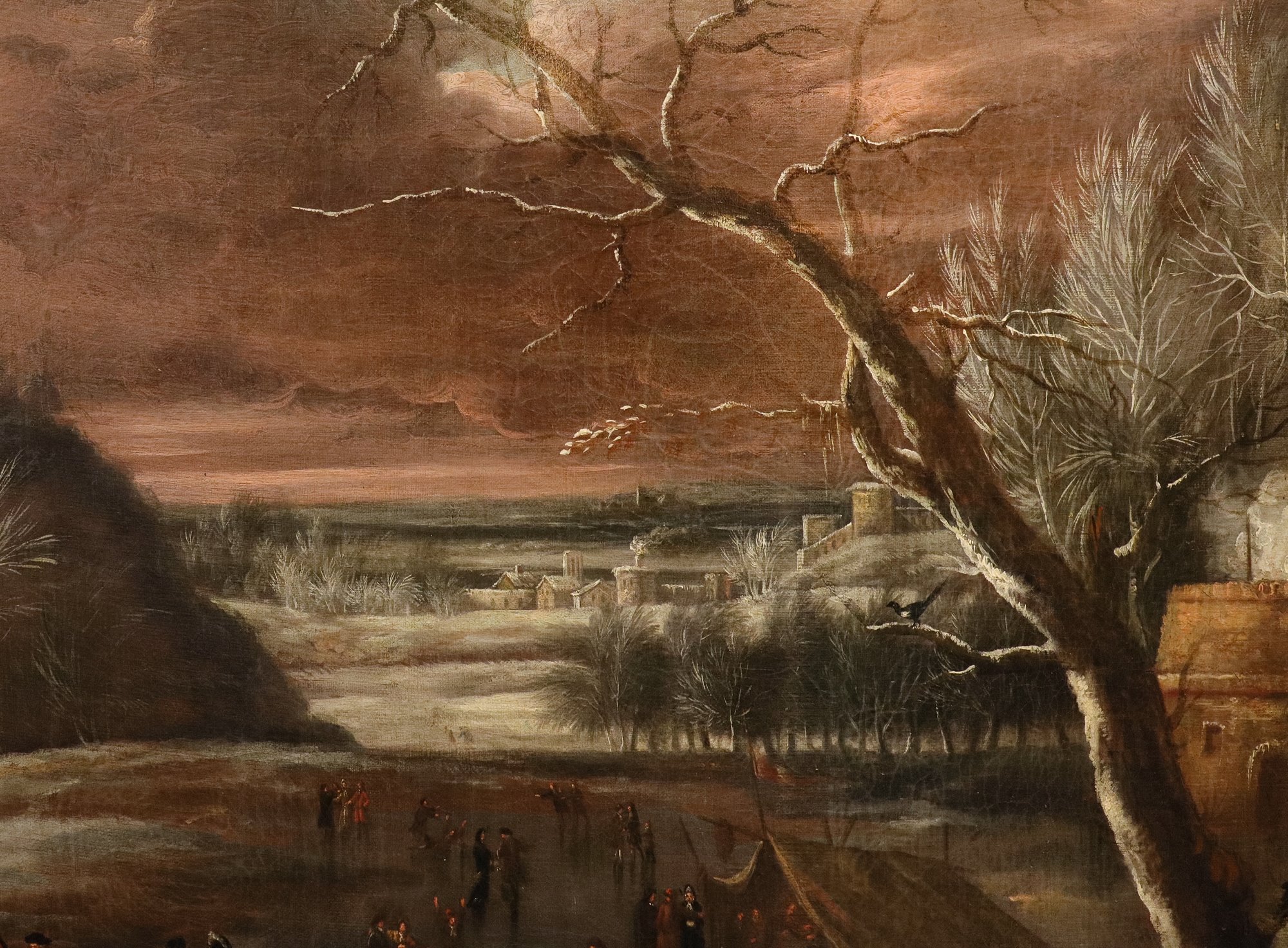 Paesaggio invernale con lago ghiacciato e pattinatori