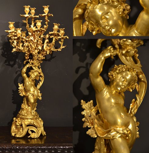 Importante candelabro a dodici luci, in bronzo dorato (h.98 cm.)