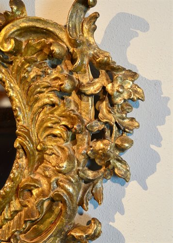 Specchiera Luigi XV riccamente intagliata periodo Rococò