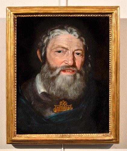 Ritratto di vecchio che sorride beffardo