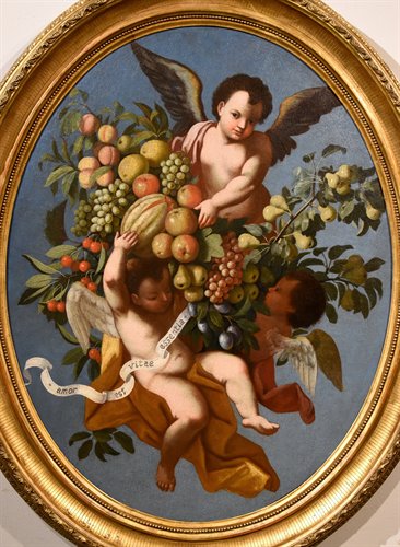 Composizione di frutta sorretta da tre angeli