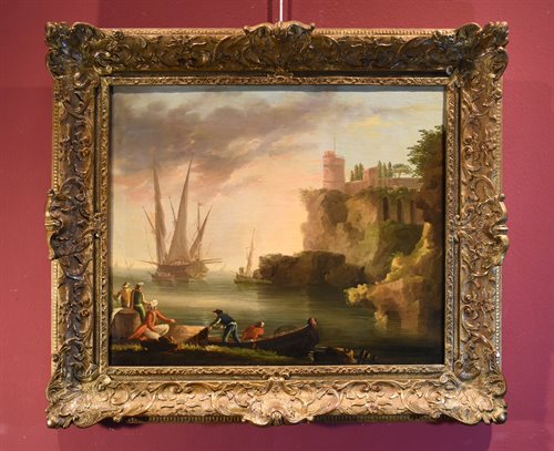 Veduta costiera con castello e imbarcazioni