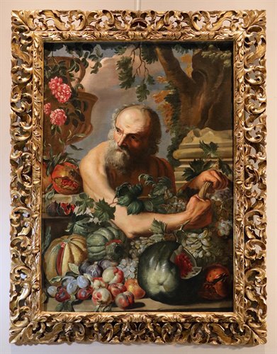Ritratto del filosofo greco Diogene con composizione di frutta e fiori
